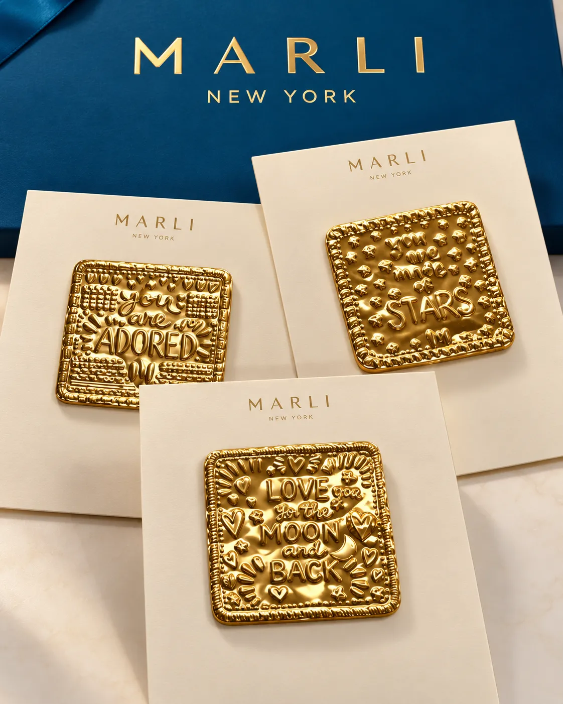 Marli New York — Gold Engraving
