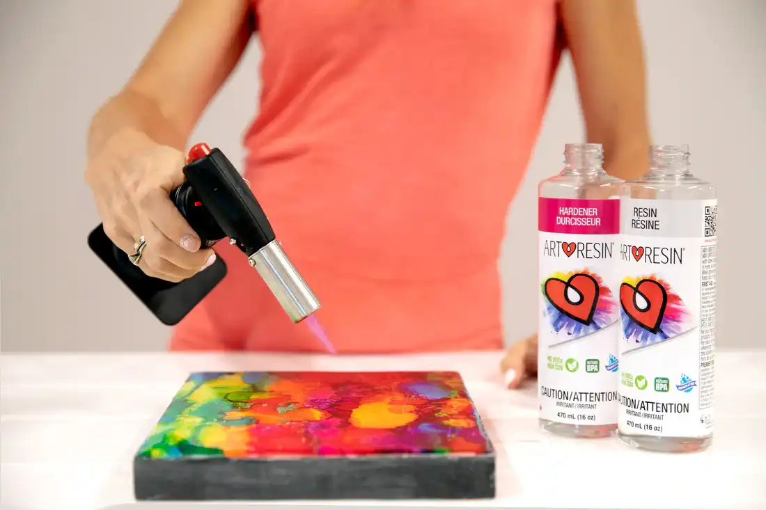 Removing bubbles in resin using a heat gun