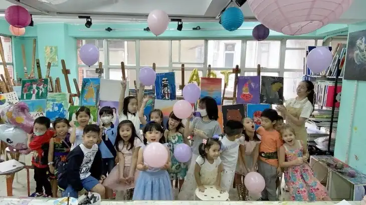Kids enjoying canvas painting in a birthday party